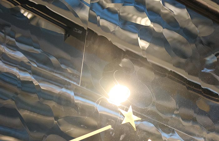 Original metallic interior finishing material